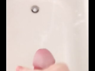 A white lad flaunts his impressive gay cock, stroking it to a massive climax on camera. This homemade gay video showcases his impressive cumshot range, leaving nothing on the webcam to chance.